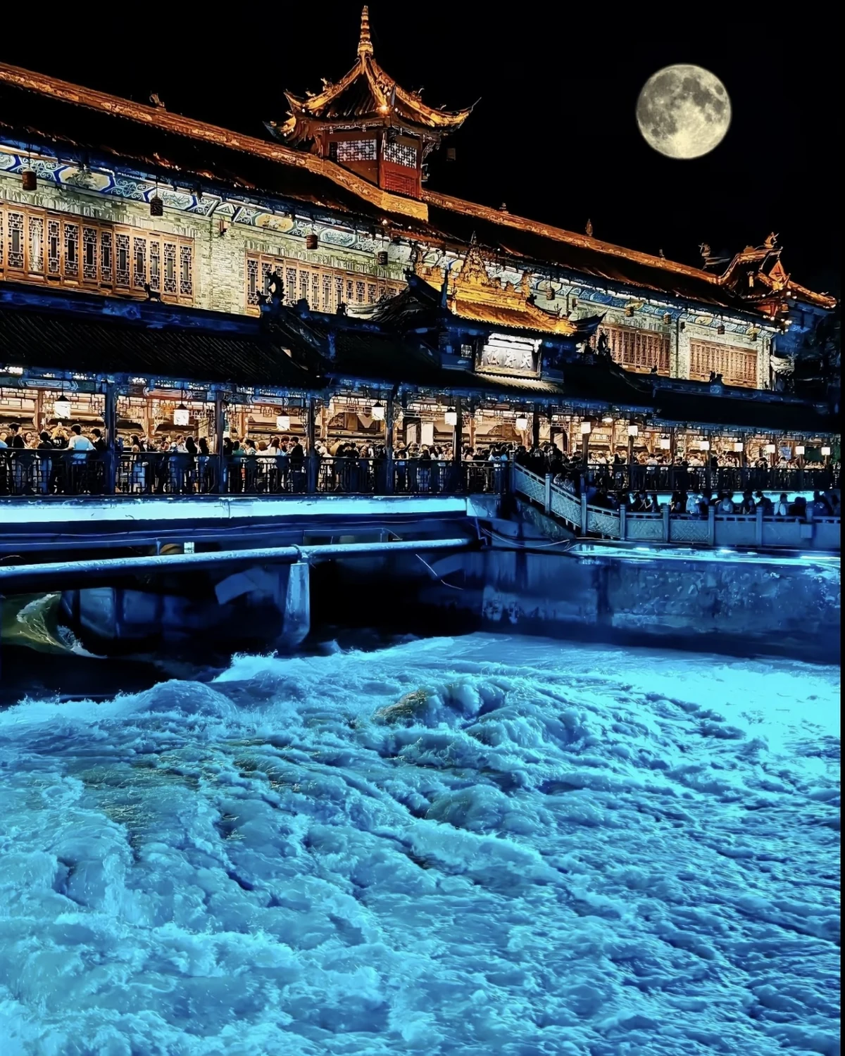 Nanqiao night view above illuminated blue water in Dujiangyan